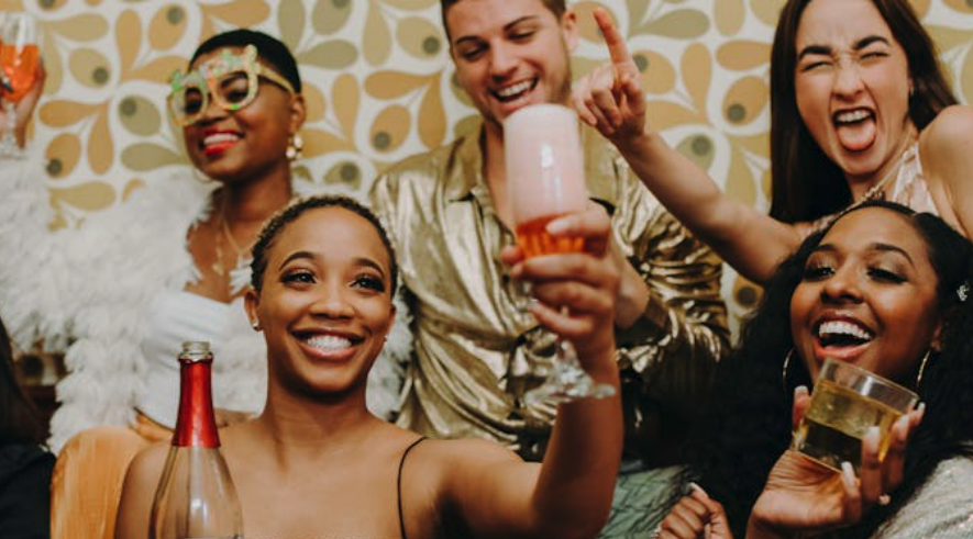 People celebrating together — the one meeting you can't replace with software